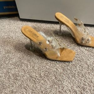 Heels with gold butterfly jewelry